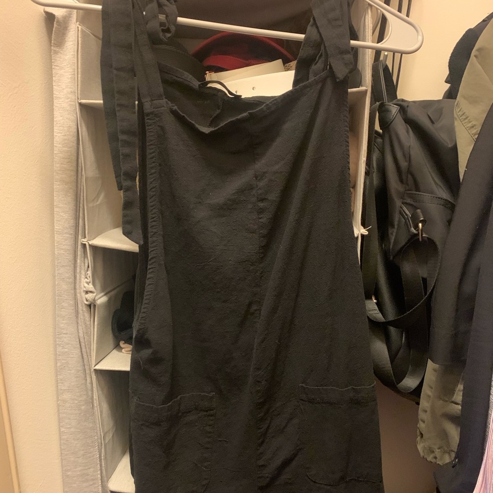 Black overall style romper with tie straps